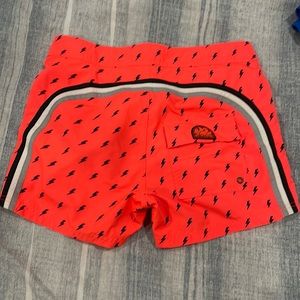 Excellent condition Sundek orange with lighting bolts. Size 30 waist